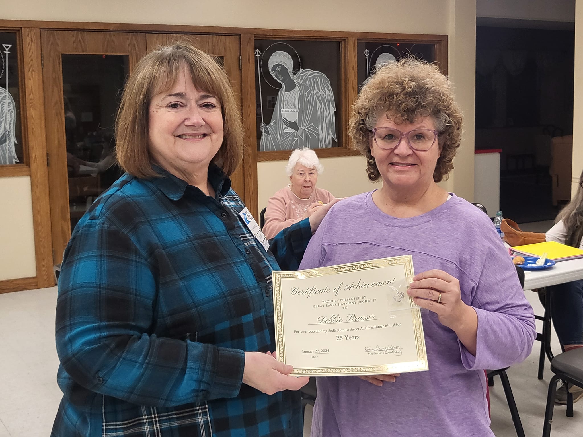 Debbie Strasser receives 25 year award